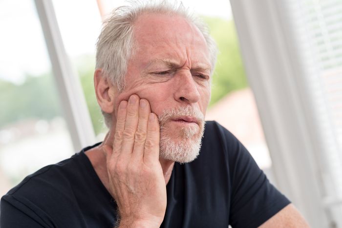 A man with toothache Dental Emergency